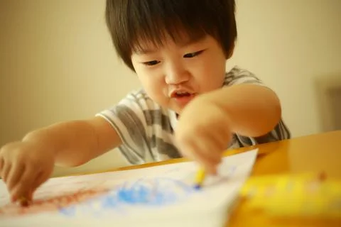 Boy drawing Stock Photos