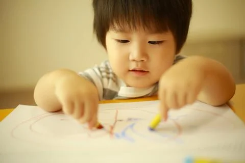 Boy drawing Stock Photos