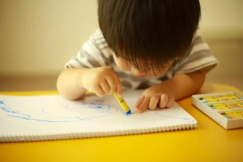 Boy drawing Stock Photos