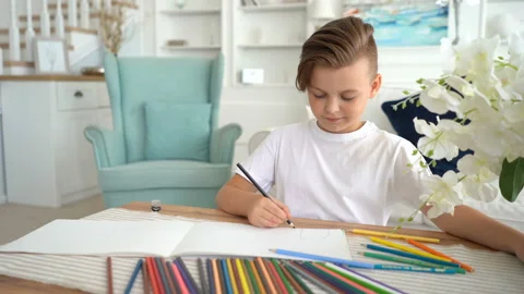 The boy drawings with pencils. Creativeness process art class developing talent Video stock 115089602