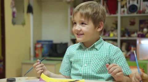 Boy draws color on paper Video stock 59376932