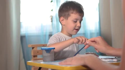 A boy draws Stock-Footage 164399515