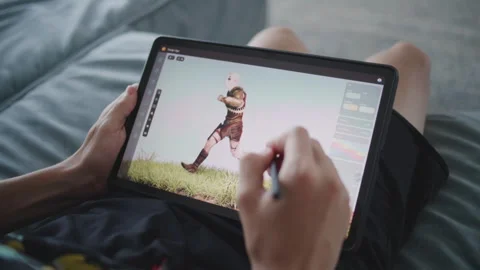Boy draws new game character using 3d modeling program Stock Footage 279689347