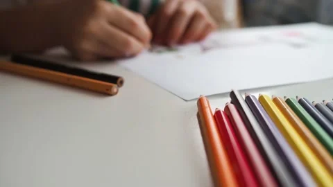 Boy draws paints with a pencil Stock-Footage 194858914