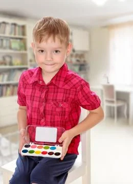 The boy draws paints Stock Photos