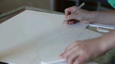 The boy draws the path of the model airplane Stock Footage 59112803