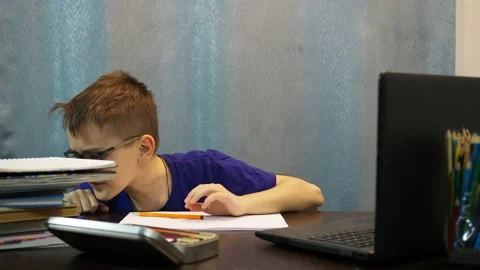 The boy draws a pencil drawing, after seeing something very surprised. he Stock Footage 145276347