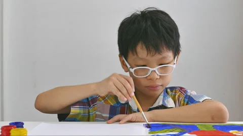 Boy draws a picture Stock Footage 56022211