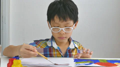 Boy draws a picture Stock Footage 56026141