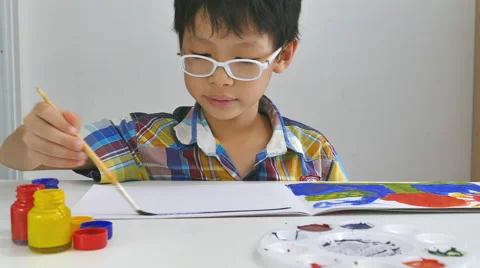 Boy draws a picture Stock Footage 56026237