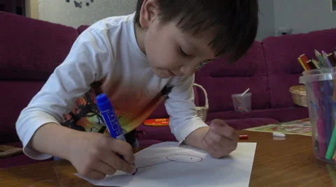 Boy draws a picture Stock Footage 63136778