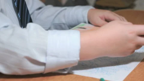 Boy draws pictures using color chalks and pencils Stock Footage 87906466