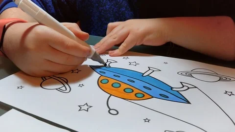 Boy draws a UFO Stock Footage 124200660