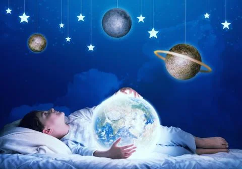 Boy dreaming before sleep Stock Photos
