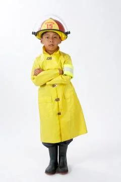 Boy Dressed as Firefighter Stock Photos