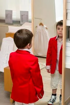 Boy dressing up Stock Photos