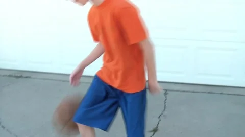 Boy Dribbling Basketball 스톡 동영상 65744237
