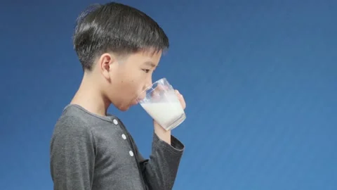 Boy drink milk Stock Footage 138722965