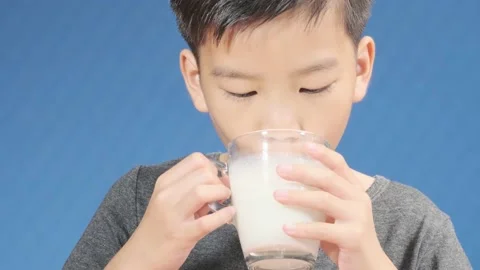 Boy drink milk Stock Footage 138722984