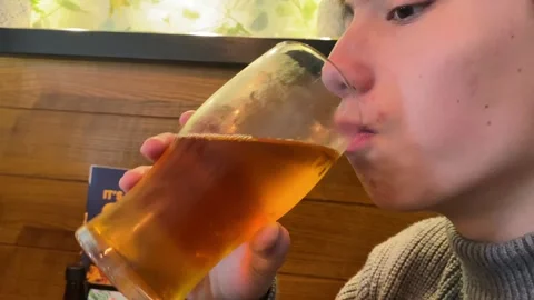 Boy drinking apple juice Stock Footage 240543512