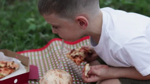 Boy drinking coconut on nature. Stock Footage 288979283