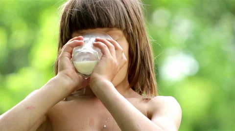 Boy drinking milk,portrait of a boy drinking milk Stock Footage 23575203