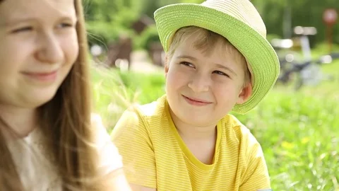 The boy is drinking water from the bottle. Stock Footage 76463221