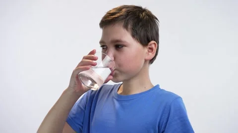 https://images.pond5.com/boy-drinking-water-glass-footage-241015912_iconl.jpeg