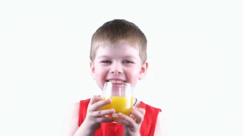 Boy drinking yellow  juice Stock Footage 37204151