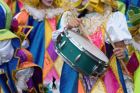 Boy drumming at carnival Stock Photos