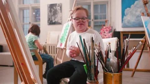 Boy during art therapy in studio. Human services for people with special needs. Stock-Footage 144669630
