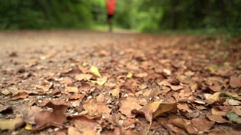 Boy during a run he throw a plastic bottle on the ground. 스톡 동영상 132206857