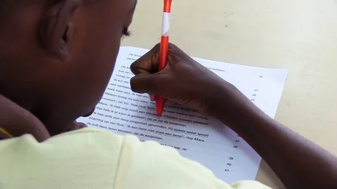 Boy at a Dutch Caribbean school making a dutch test Stock-Footage 105829945