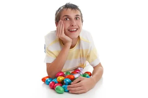 Boy with easter eggs and looking up Stock Photos