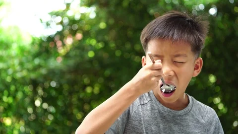 Boy eat rice Stock Footage 95419738