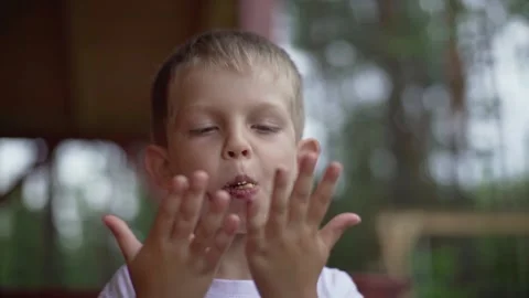 Boy eating a cake Stock Footage 136918042