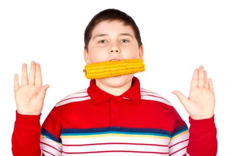 Boy eating corn Stock Photos