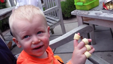 Boy eating crisps Stock Footage 91771279