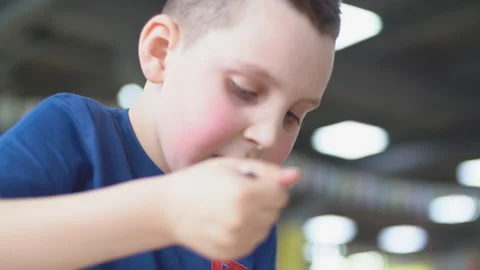 Boy eating dessert Stock Footage 106929841