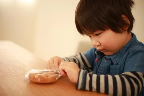 Boy eating donuts ​ Stock Photos