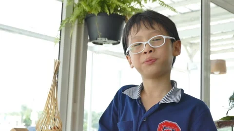 Boy eating fresh tomatoes Stock Footage 57303382