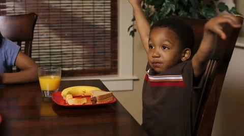 Boy eating his lunch Stock Footage 61657308