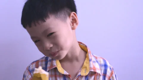 Boy eating ice cream Video stock 38286181