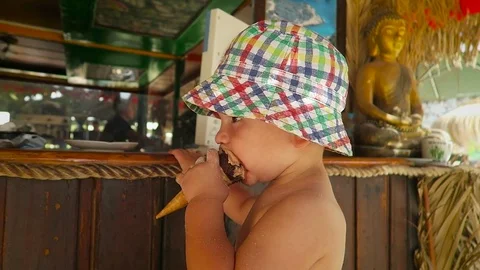 Boy eating an ice cream  Stock Footage 71351703