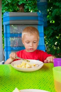 Boy eating. Stock Photos