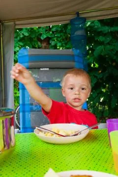 Boy eating. Stock Photos