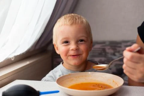 Boy eating. Stock Photos
