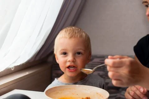 Boy eating. Stock Photos