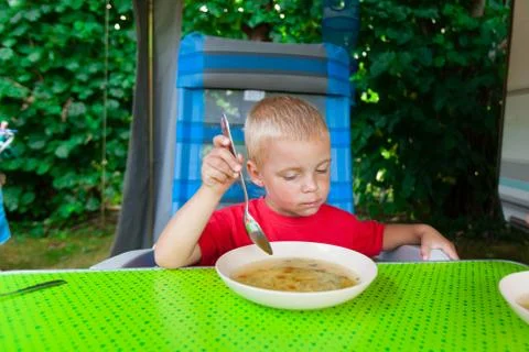 Boy eating. Stock Photos
