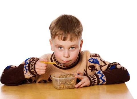 Boy eating Stock Photos